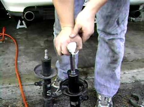 testing shock goes up easy pulls down hard|how to test shock absorbers.